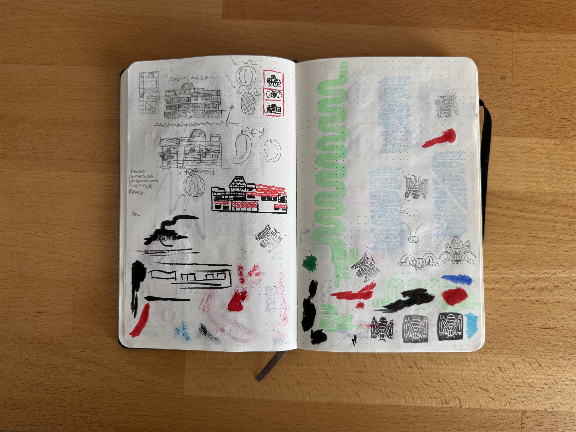 A sketchbook spread of pencil studies for hotel buildings and tropical fruit, beside inked test stamps of a repeating glyph motif printed in rows